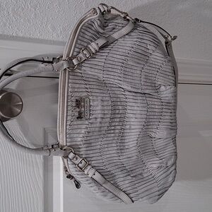 Coach brand Elegant Cream Designer Handbag